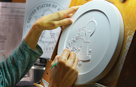 U.S. Mint medallic artist sculpts a coin model